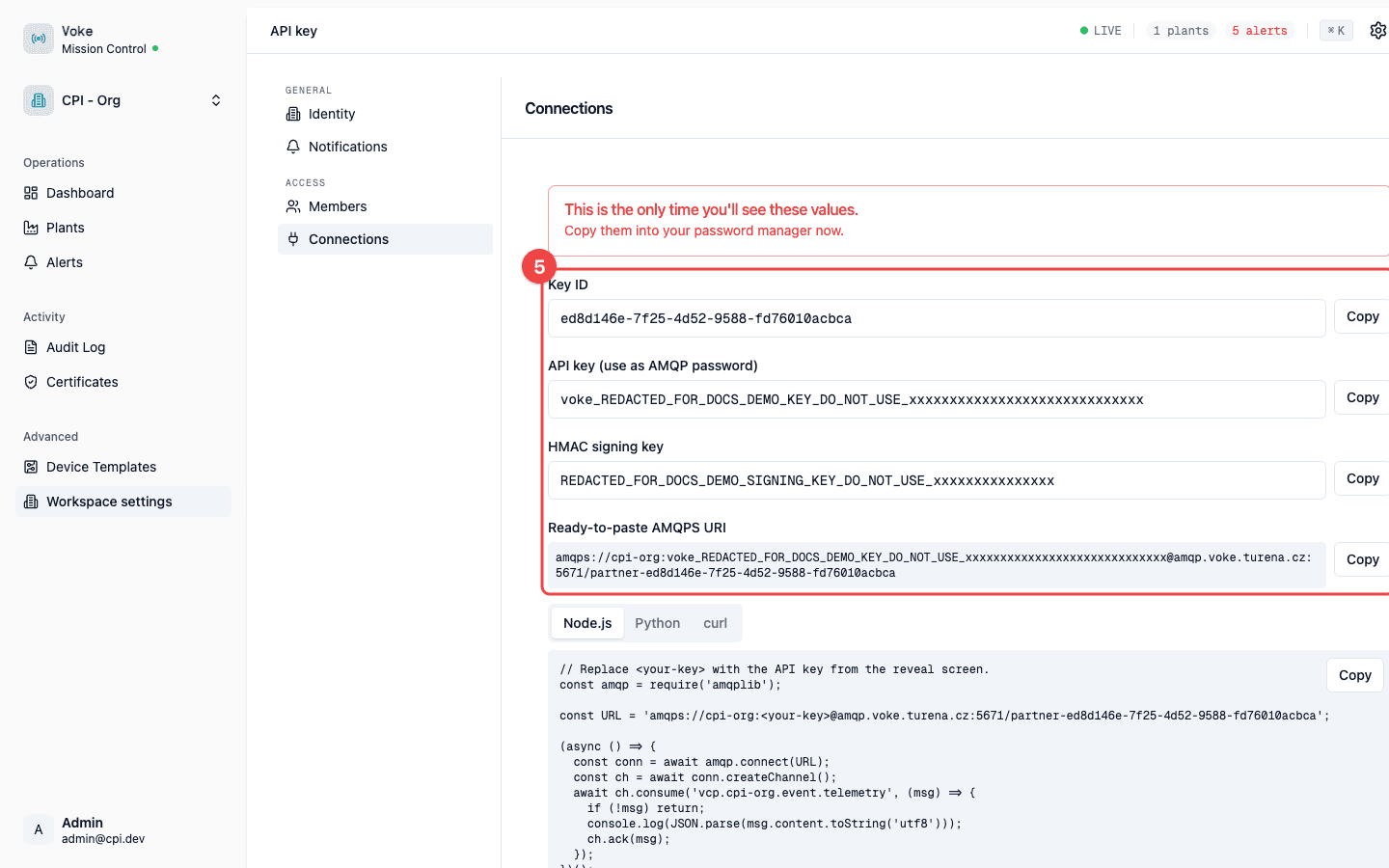 Reveal screen showing Key ID, API key, HMAC signing key, and ready-to-paste AMQPS URI